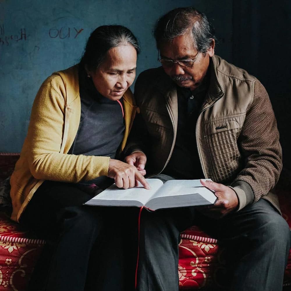 A couple reading the FireBible together